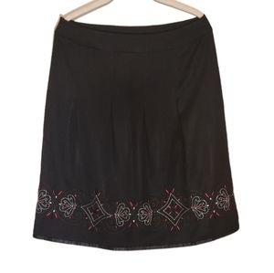 LOFT pleated black skirt with embroidered design and eyelets size 6
